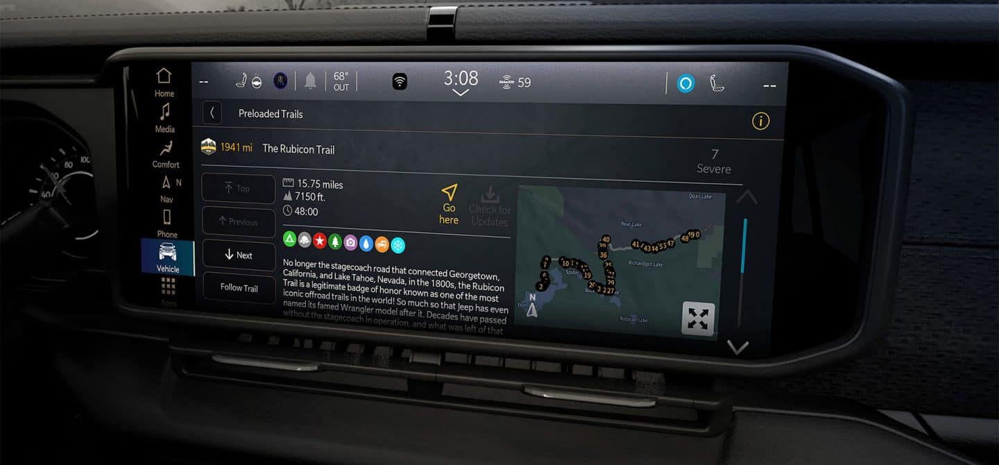 La pantalla táctil Uconnect de la Jeep Gladiator 2025, mostrando una de las guías de aventuras todoterreno.