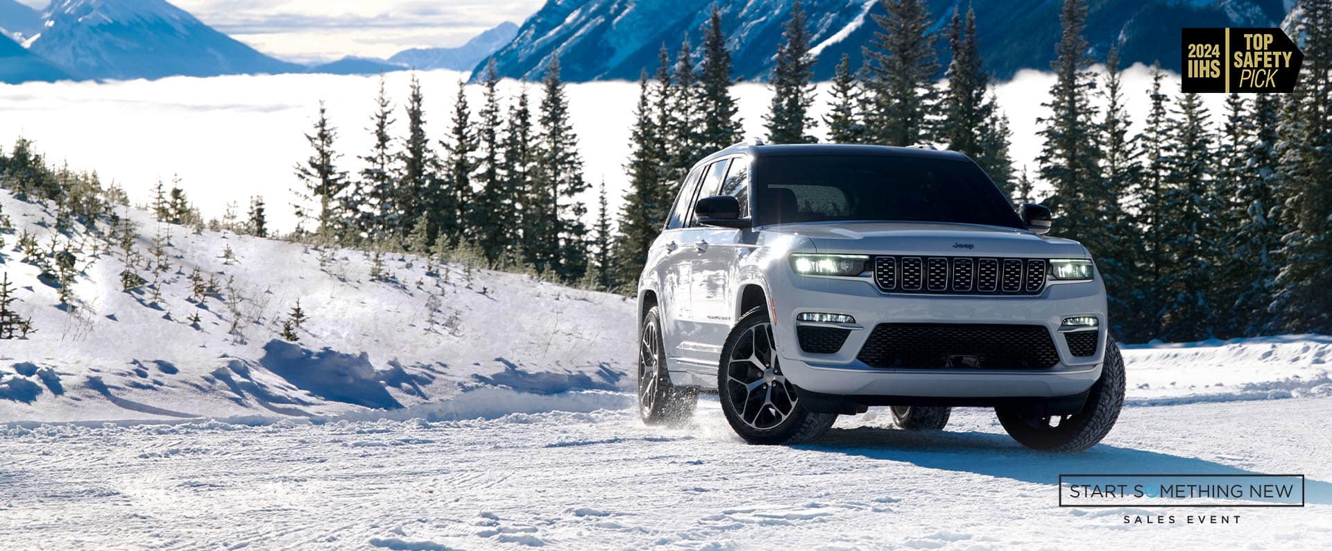 A white 2024 Jeep Grand Cherokee Summit Reserve traveling on a snow-covered road in the mountains. 2024 IIHS Top Safety Pick. Start Something New Sales Event logo.