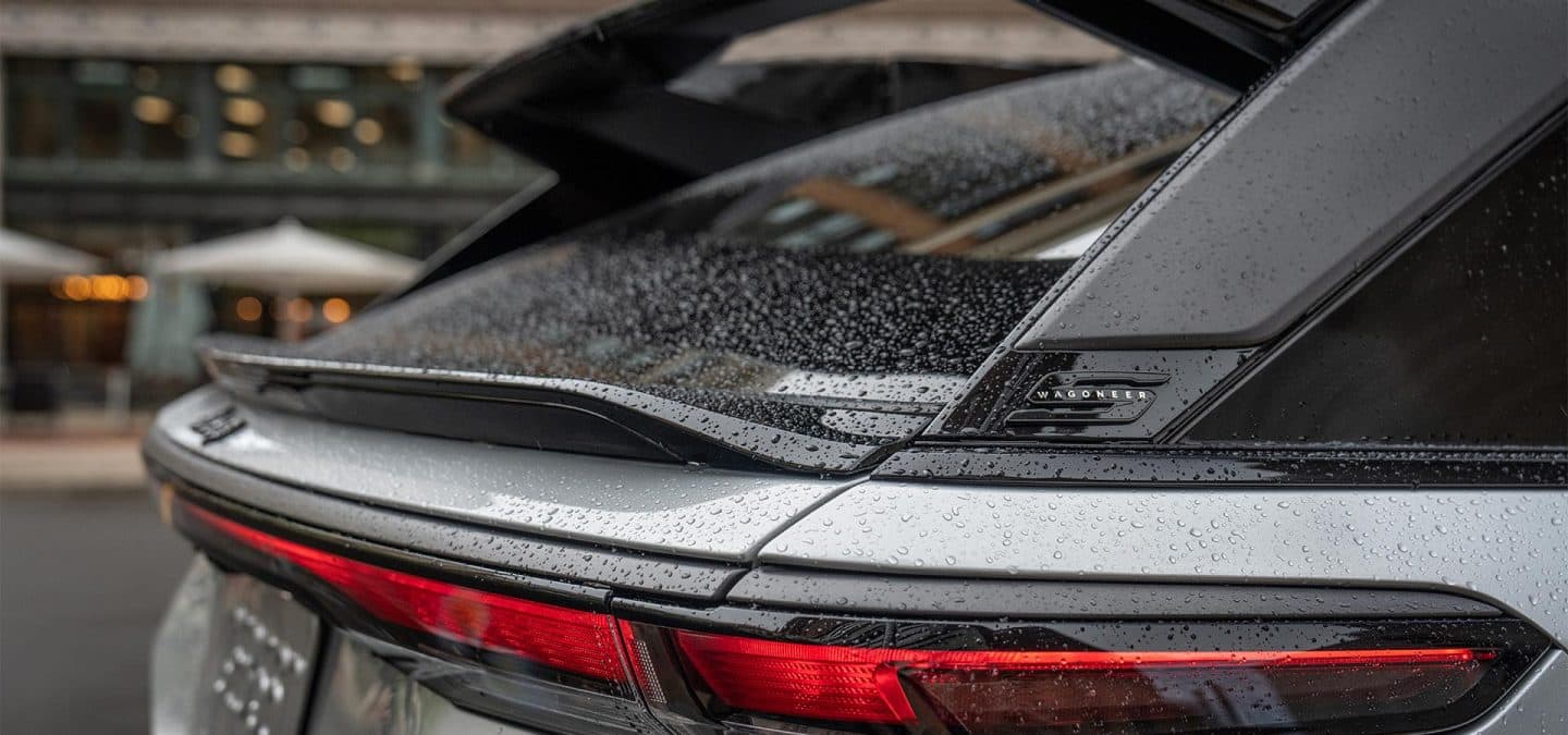 Display The rain-covered rear window and spoiler on a 2025 Jeep Wagoneer S Launch Edition.