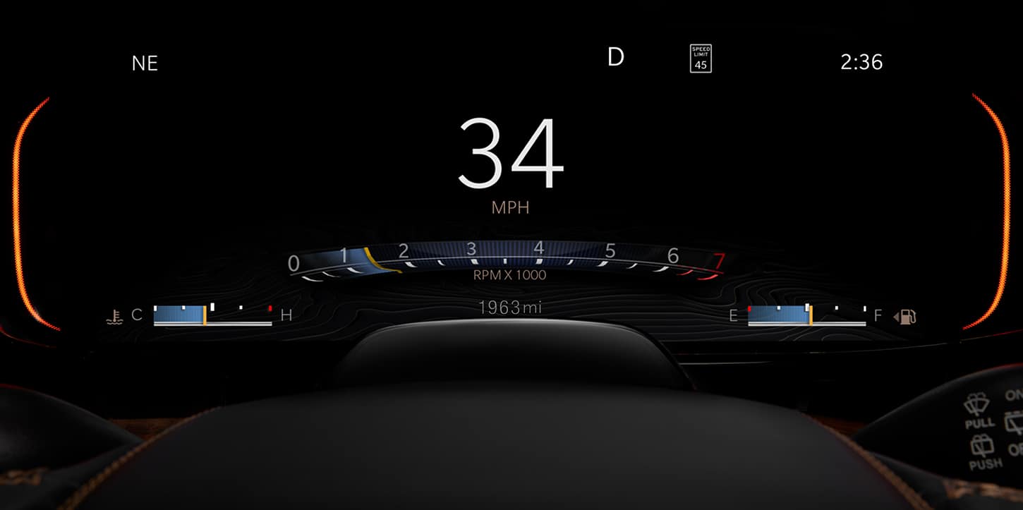 The Digital Cluster in the the 2025 Jeep Wagoneer displaying the compass direction, gear, current speed limit, time, actual speed the vehicle is traveling, coolant gauge, total miles driven and fuel gauge.