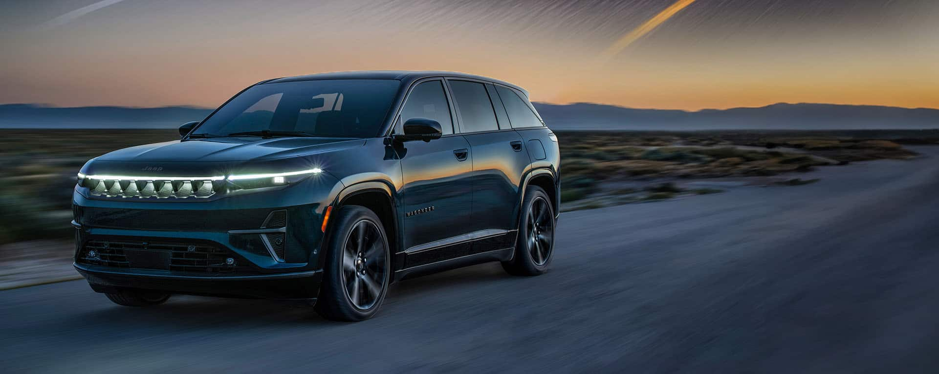 A dark blue 2025 Jeep Wagoneer S Launch Edition.